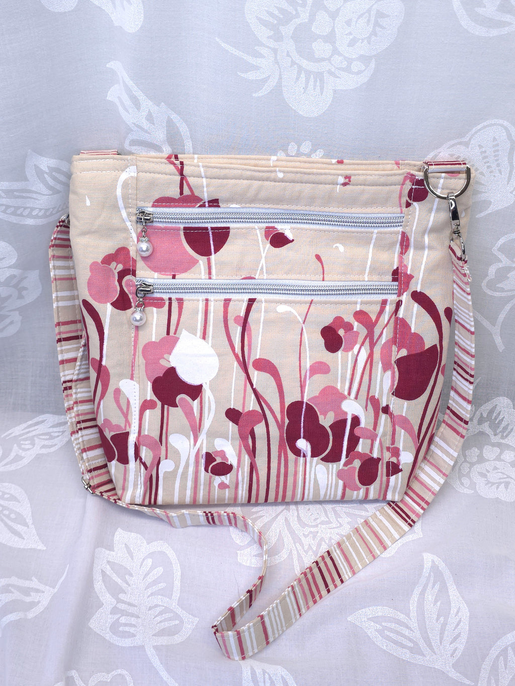 Crossbody m aftagelig håndsyet strop