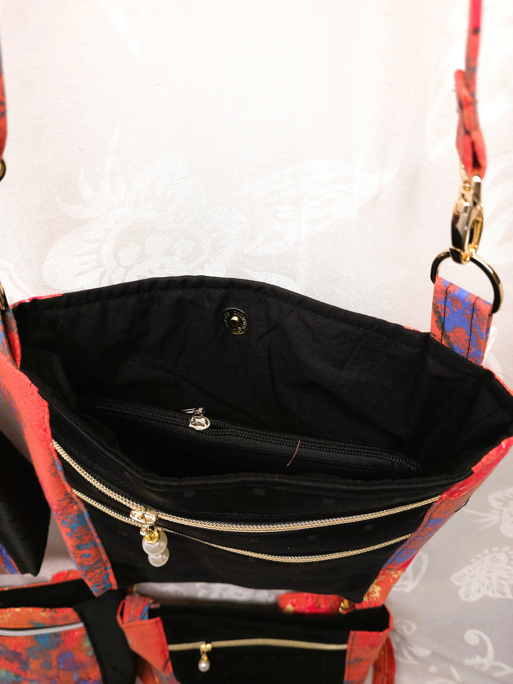 Crossbody m aftagelig håndsyet strop