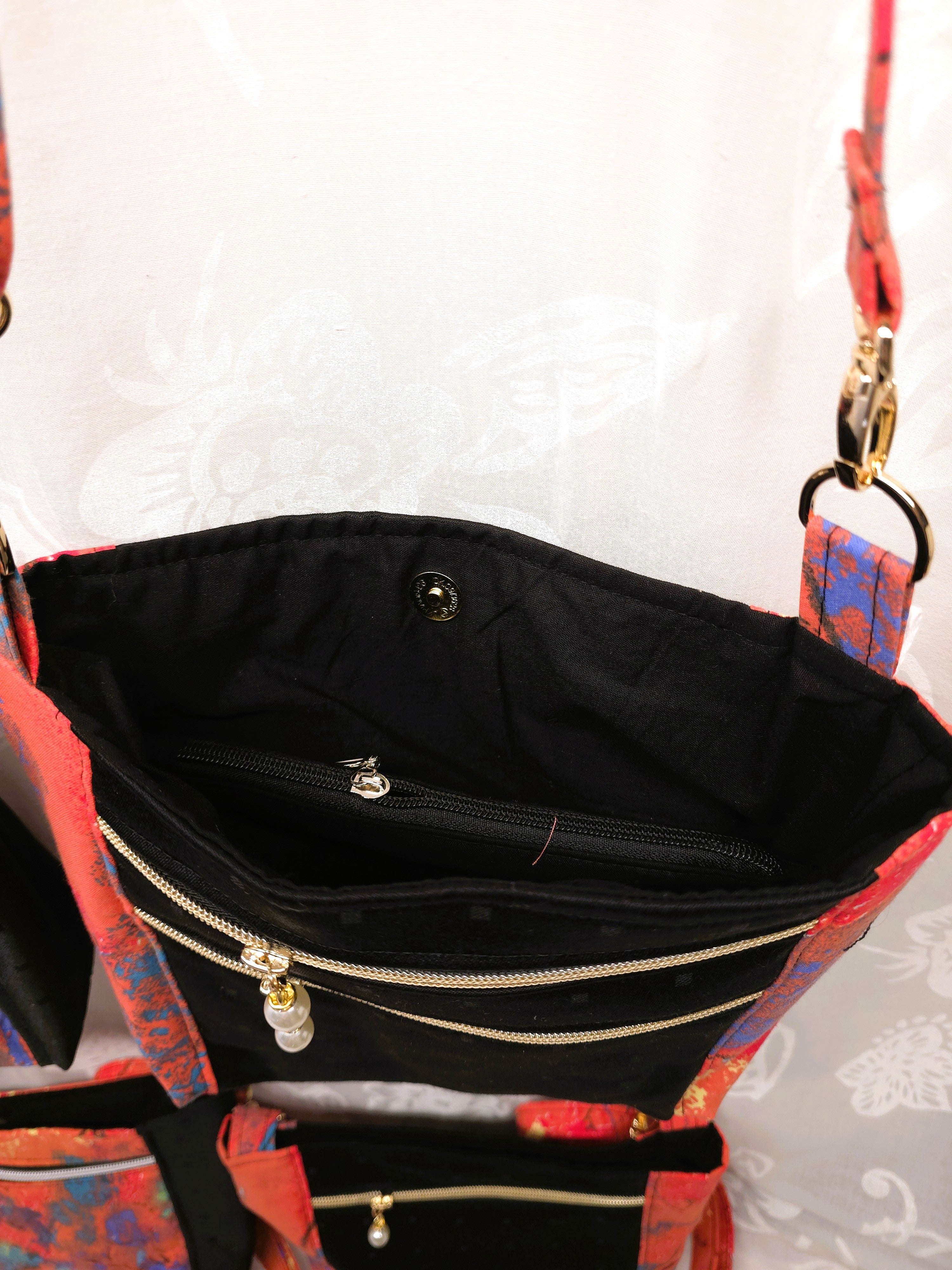 Crossbody m aftagelig håndsyet strop