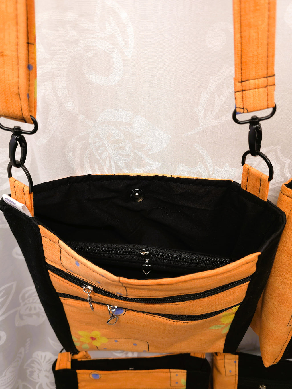 Crossbody m aftagelig håndsyet strop