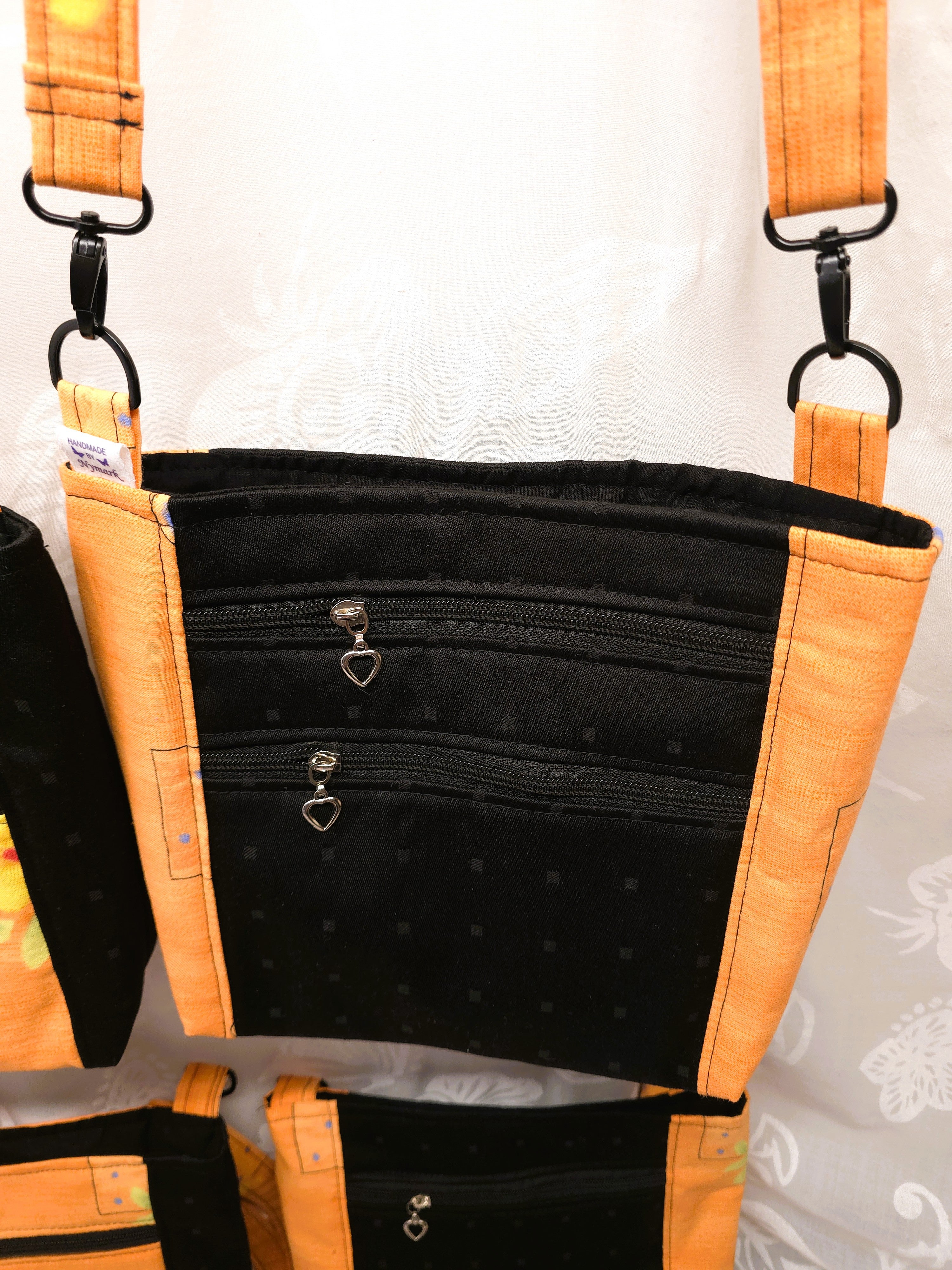 Crossbody m aftagelig håndsyet strop