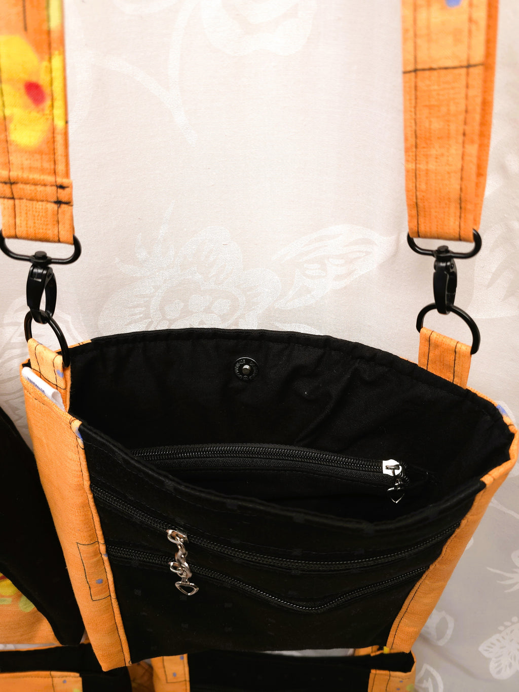 Crossbody m aftagelig håndsyet strop